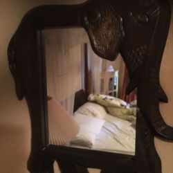 Elephant Mirror with metal finish.