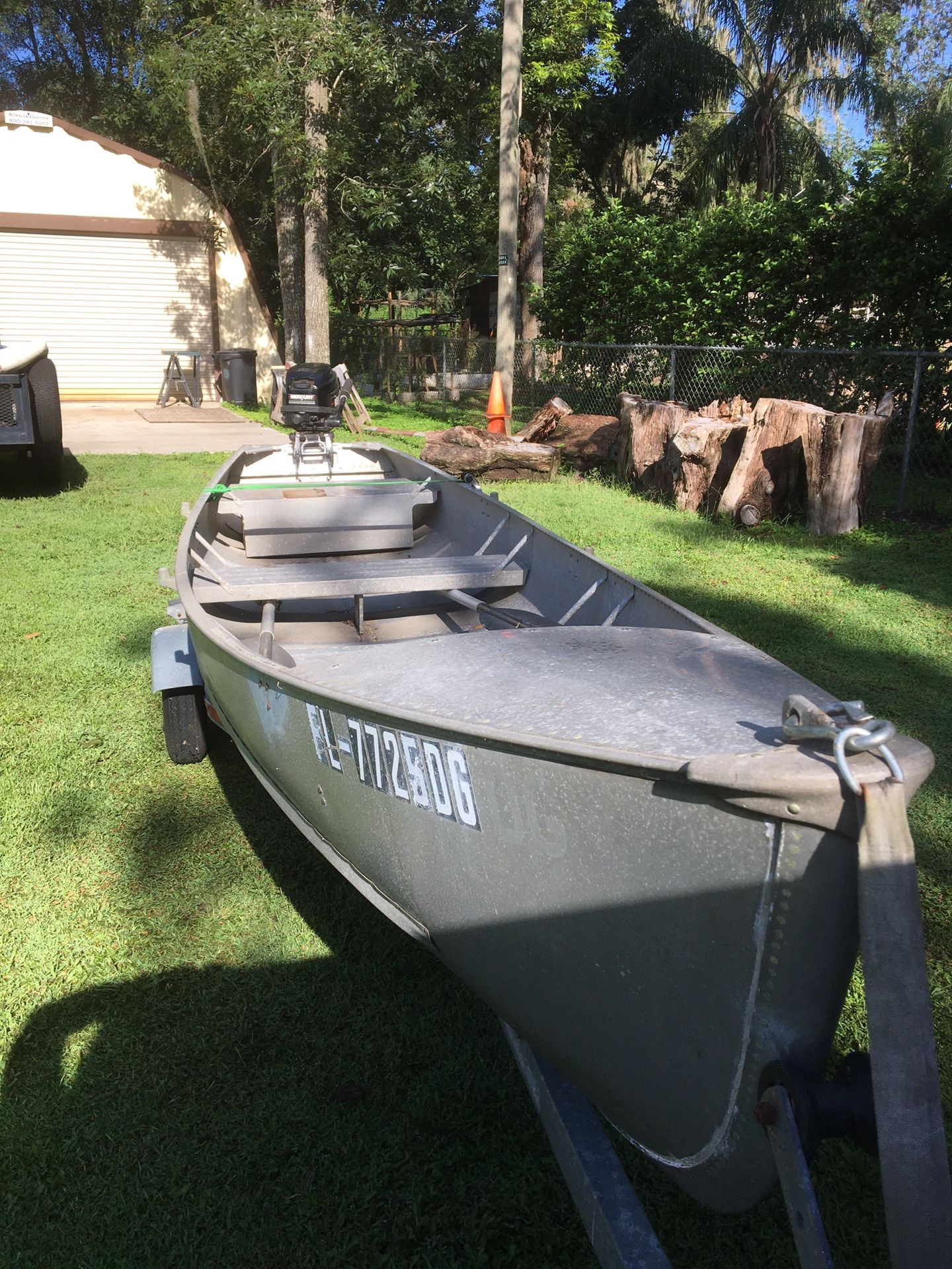 15’ Gruman aluminum Gheenoe with early 1990’s model 9.9 Mercury. Good