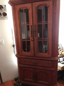 Corner wooden cabinet