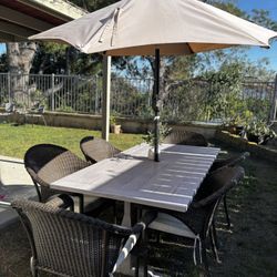 Beautiful Allen + Roth Outdoor Dining Set with 6 Wicker Chairs, Umbrella, and Plant