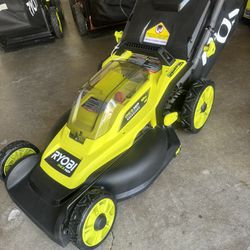 18V  Brand New Lawn Mower 2 Batteries  And Charger Including 