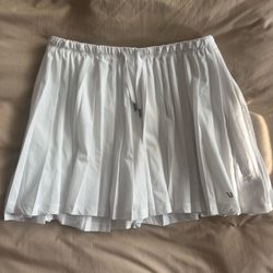 VUORI white golf tennis skirt with built in shorts  Clementine Pleated Skirt