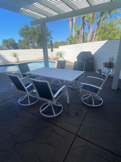 Outdoor Dining Table with 6 (swivel & rocking) Chairs……includes 9 foot Patio Umbrella with stand & cover