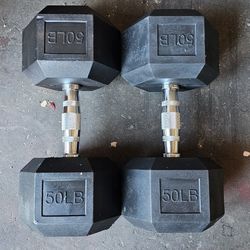 Brand New Pair Of 50 Pound Dumbbells 