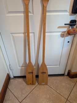 Pair of Feather Brand Caviness Woodworking Co. Wooden Paddles