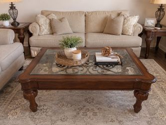 Solid wood coffee table with glass top