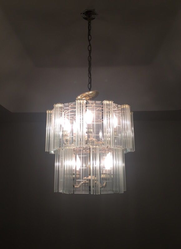 Elegant Crystal and Gold Chandelier and light bulbs fixture
