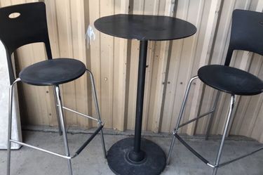 Bar height table and chairs
