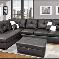 Black Leather sectional Couch And Ottoman 
