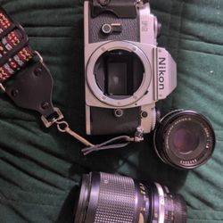 Nikon FG 35mm Film Camera + 50mm f/1.8 + 35-105mm Lens – Works