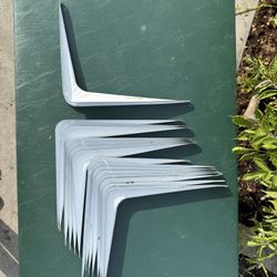 White metal shelf brackets