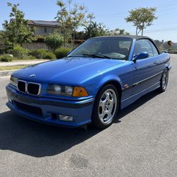 For Sale 1999 BMW E36 M3 Automatic Estoril Blue 2 door convertible in great condition ! 