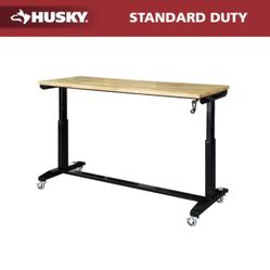 Husky 62 in. W x 24 in. D Adjustable Height Black Workbench Table with Solid Wood Top