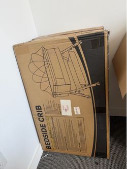 Brand new bedside crib for baby