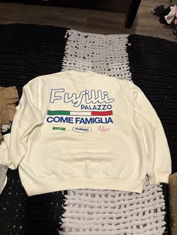This is a Madhappy x Jon & Vinny's "Fusilli Palazzo" Heritage Crewneck sweatshirt in the color "Azzurro" or "Creme