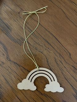 Adorable Wooden Rainbow Ornament with a Gold Metallic String for Hanging