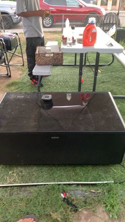 Coffee table /Black Center Channel Speaker/ refrigerator