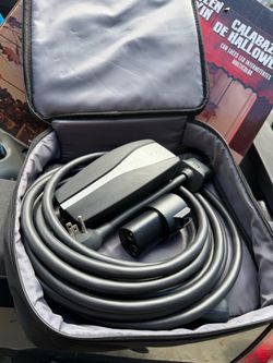 Tesla charger brand new never used