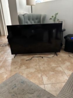 Free 55” Flat Screen TV with Stand