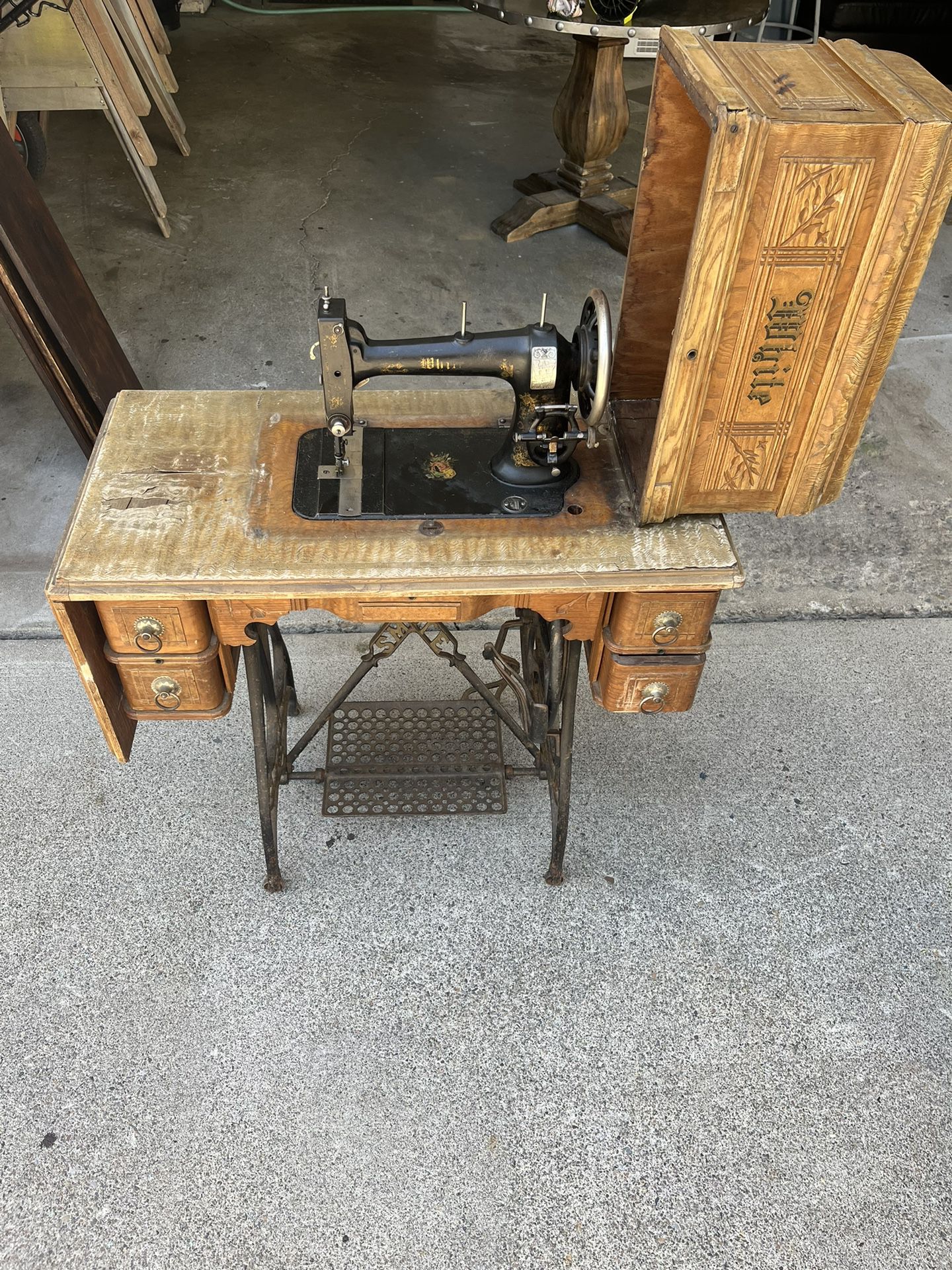 Vintage 1876, Antique White Rotary pedal treadle sewing machine And Table.  Made in the USA. Brand is white. 
