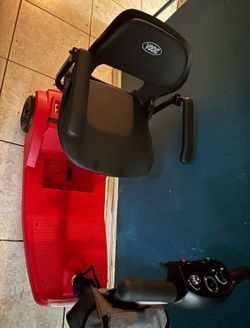 Red mobility scooter