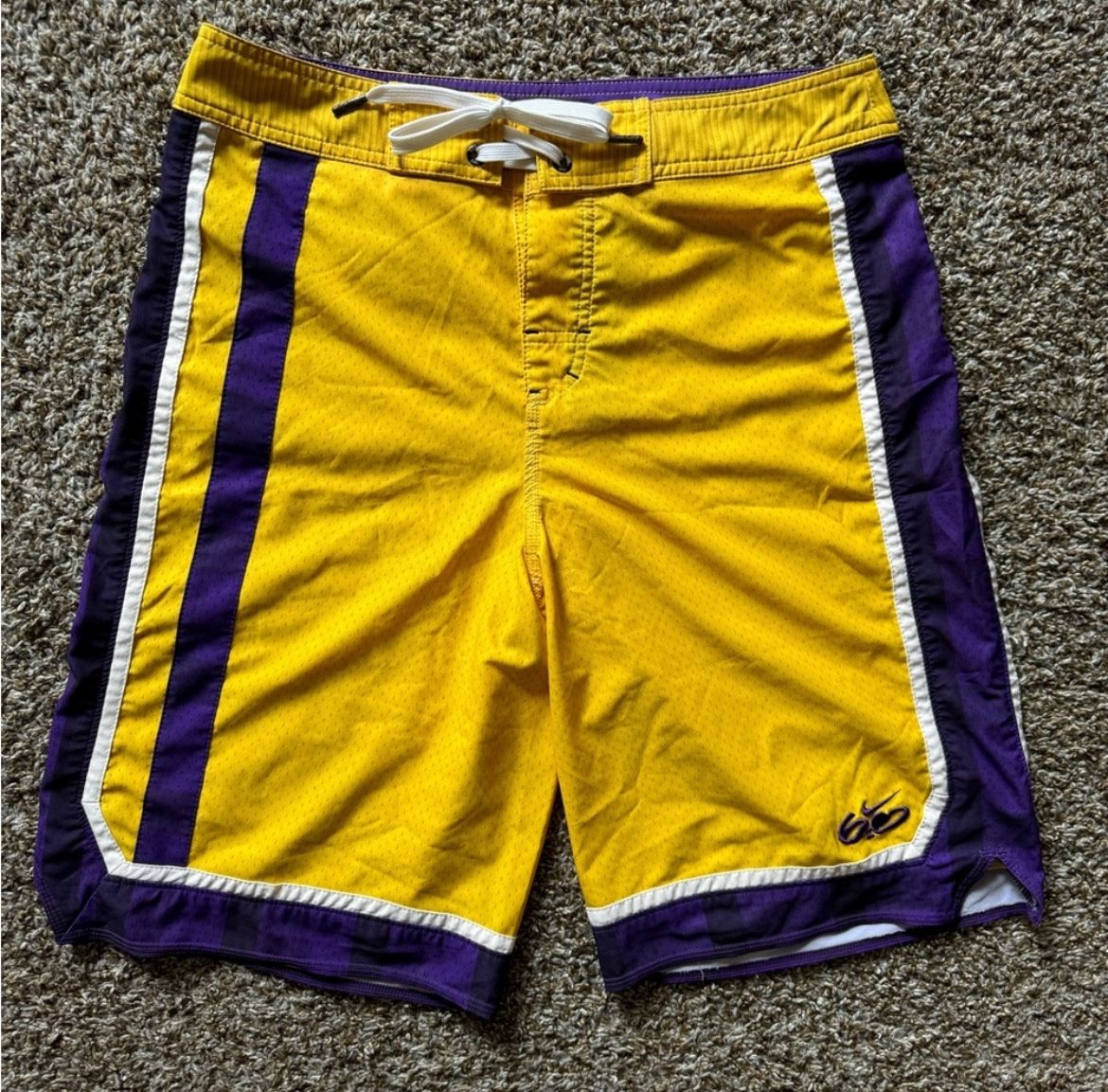 Nike 6.0 Lakers jersey style purple and gold swim board shorts in size 30