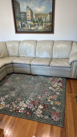 FREE.    Four pice sectional leather sofa