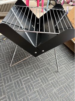 Portable charcoal grill