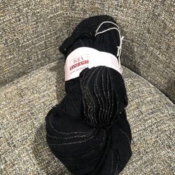 Igea discontinued hand knit yarn, 1 skein, artista, black with gold edge