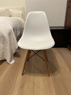 White Molded Plastic Side Chair with Wood Legs (like a shell chair)