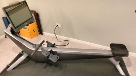 Hydrow rowing machine and mat