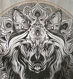 Original Wolf mandala painting by artist Chris Saunders