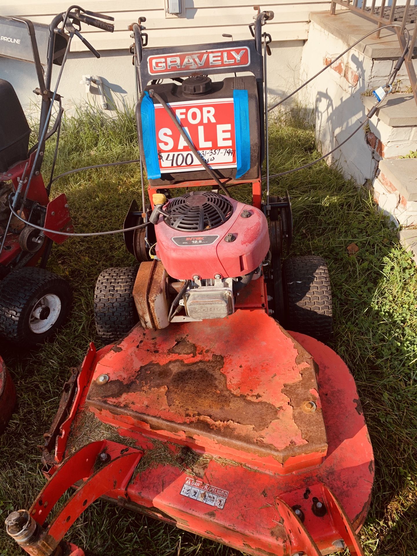 Toro 48 inch and Gravley 32 inch commercial mowers