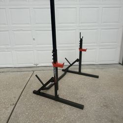 Sunny Health & Fitness Multifunctional Adjustable Bench Press Squat Rack  $110   
