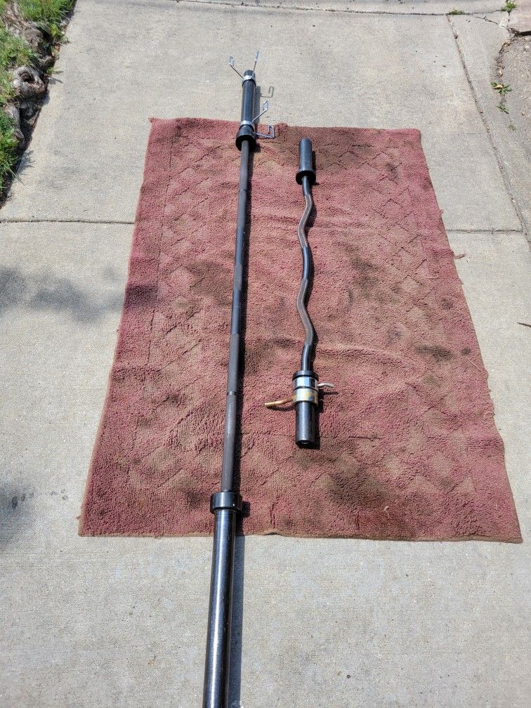 OLYMPIC BARS 2" HOLE 7' AND EZ-CURL BAR
7111.S WESTERN WALGREENS
$130. CASH ONLY AS IS