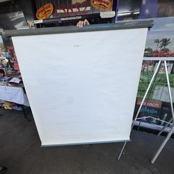 Projector screen  52” wide Pull down projector.  54” tall