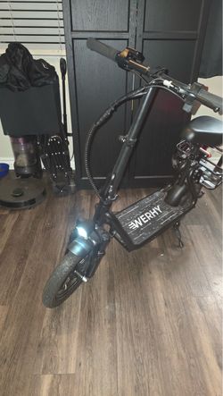 Seated electric scooter