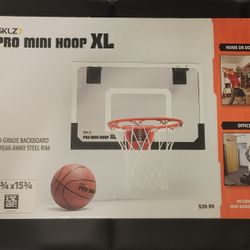 The item shown is a SKLZ Pro Mini Hoop XL, an indoor basketball hoop designed to fit over doors. 