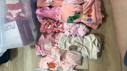 Bag of baby girl clothes