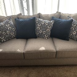  Brand new sofa sleeper. Gray  Sat On Onace Sleeper never used excellent condition1,800