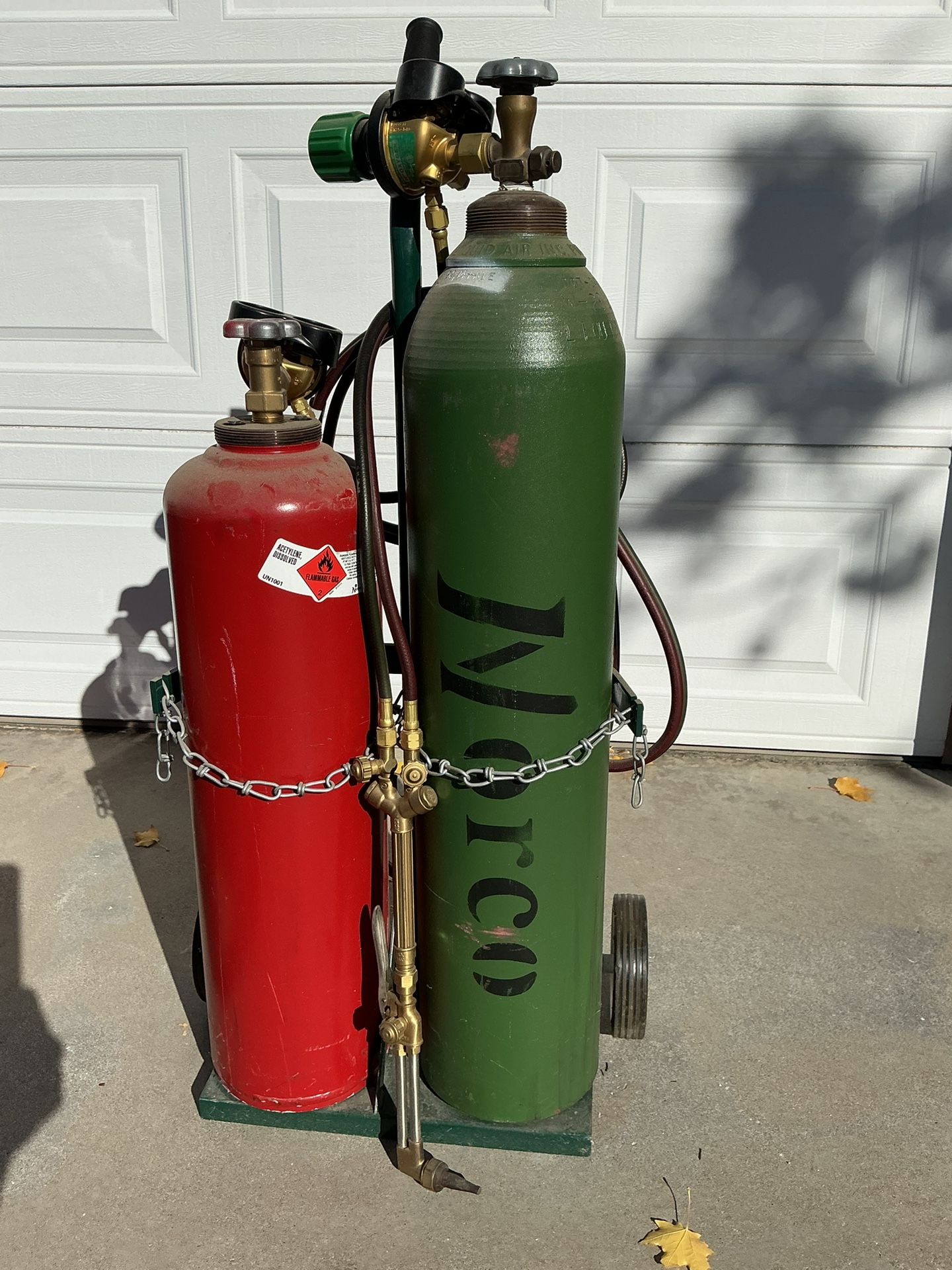 Victor cutting torch, Q bottles and cart