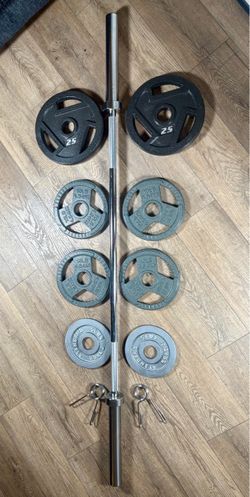 Olympic 6 ft Bar Steel Bar With Cooper Bearings[& Weight Plates: 2X 25s, 4X 10s, and 2X 5s, ] Total 142 lbs]