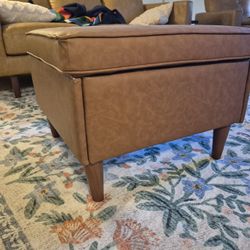 Faux leather storage ottoman