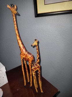 Wooden giraffe figurines.