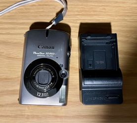 Canon PowerShot SD950 IS Digital ELPH 12.1MP 3.7x IS Silver Camera w/Charger