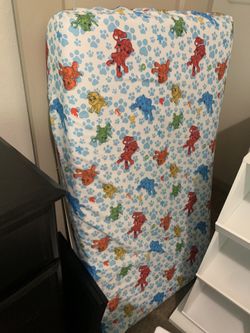 Crib mattress with mattress protector