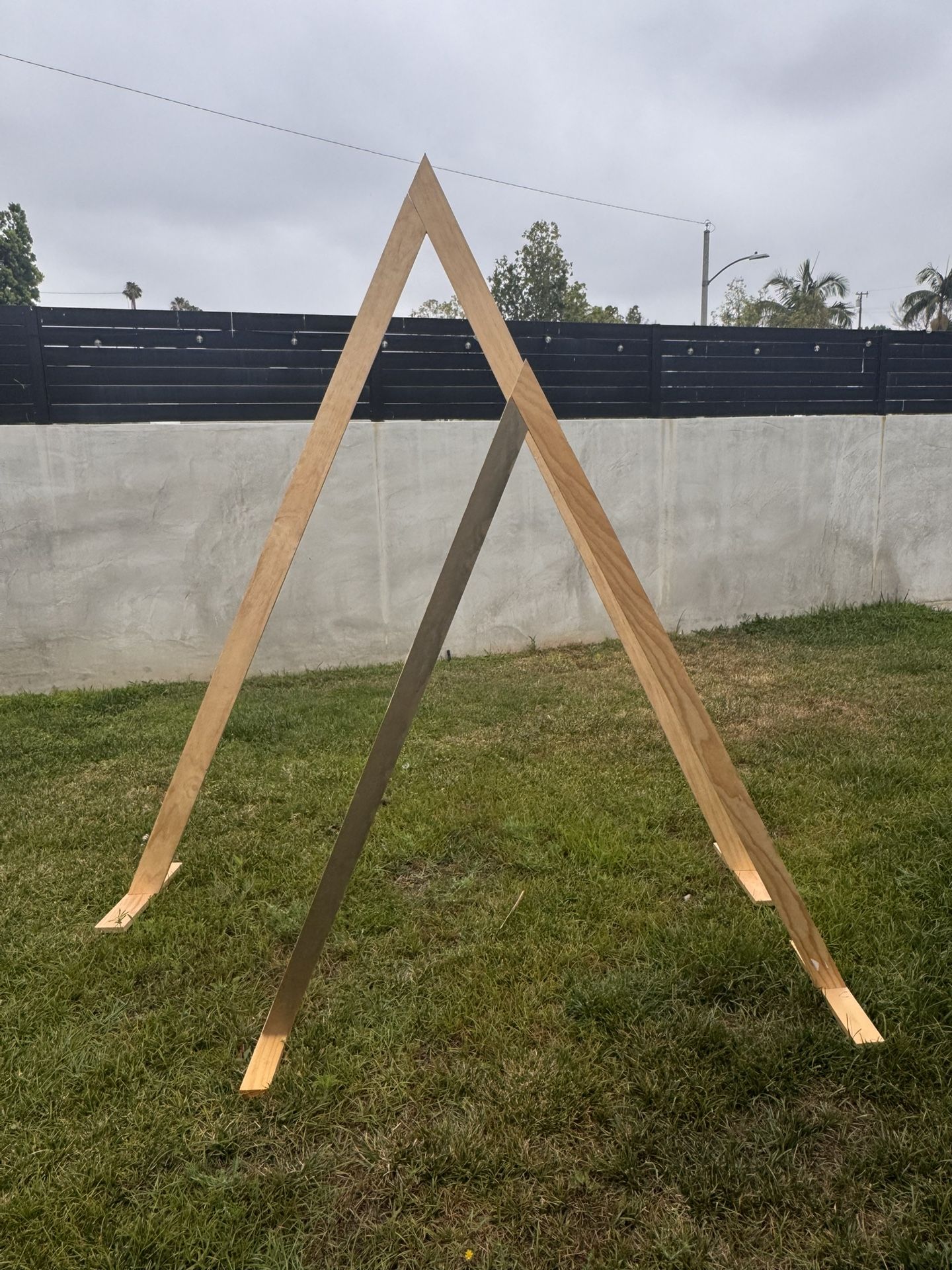 Wooden Triangle Arches Backdrop