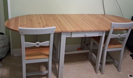 Wood Dining table with larger conversion option