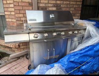 Jenn Aire large outdoor grill and rotisserie and large grill cover