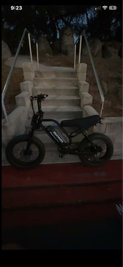 E bike 31 mph very good breaks with 2 shocks and front suspension 1500 watt motor 48v battery